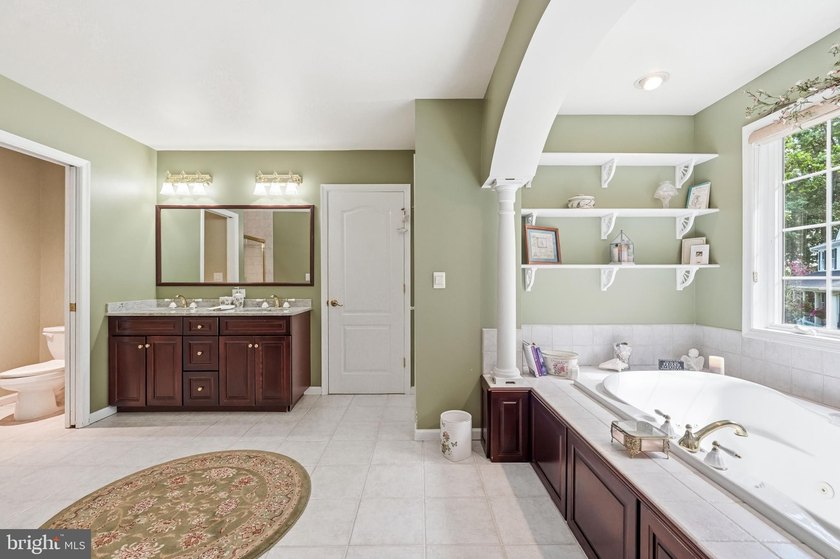 Welcome to 25 Foxtail Court, an extraordinary custom-built - photo 49