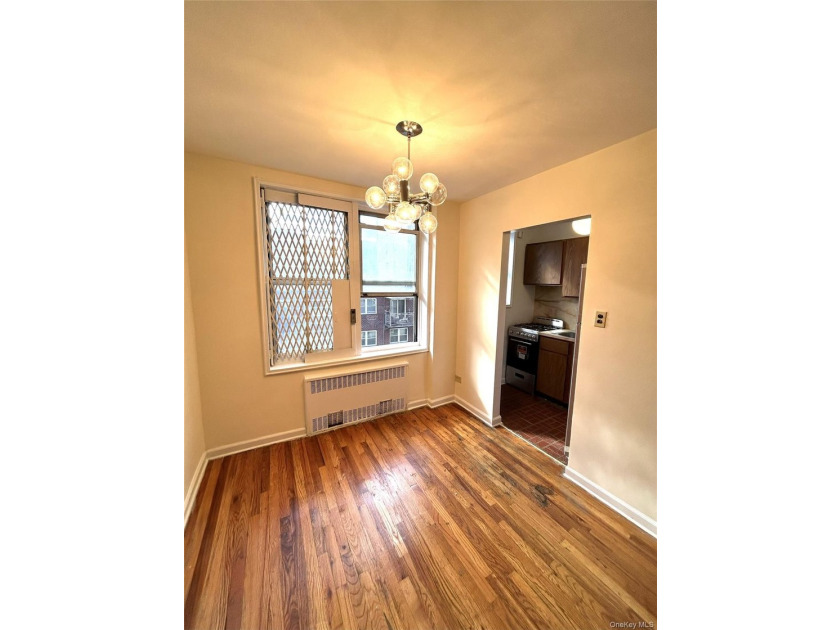 Welcome to Residence 4P at 67-30 Clyde Street - a sun-drenched - photo 2