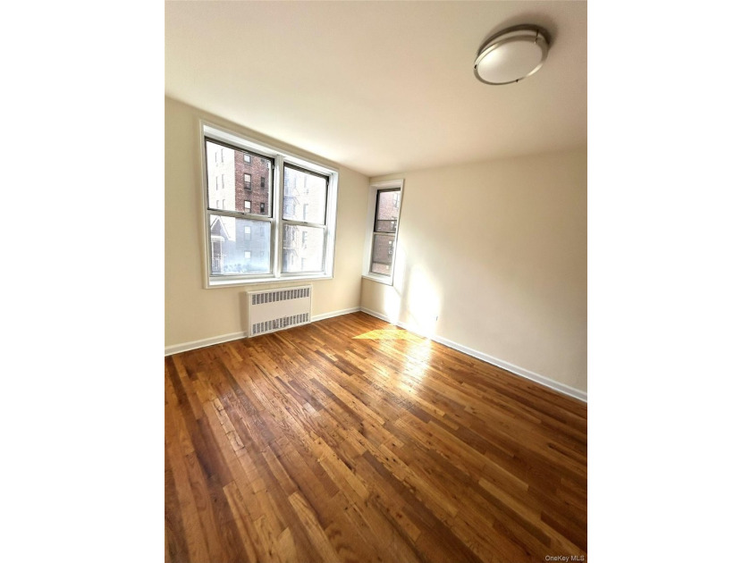 Welcome to Residence 4P at 67-30 Clyde Street - a sun-drenched - photo 4
