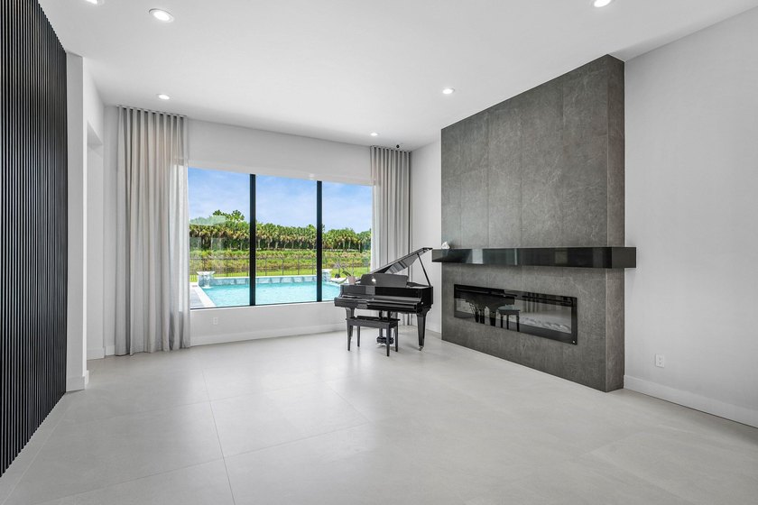 Nestled behind the prestigious gates of Boca Bridges, this - photo 6