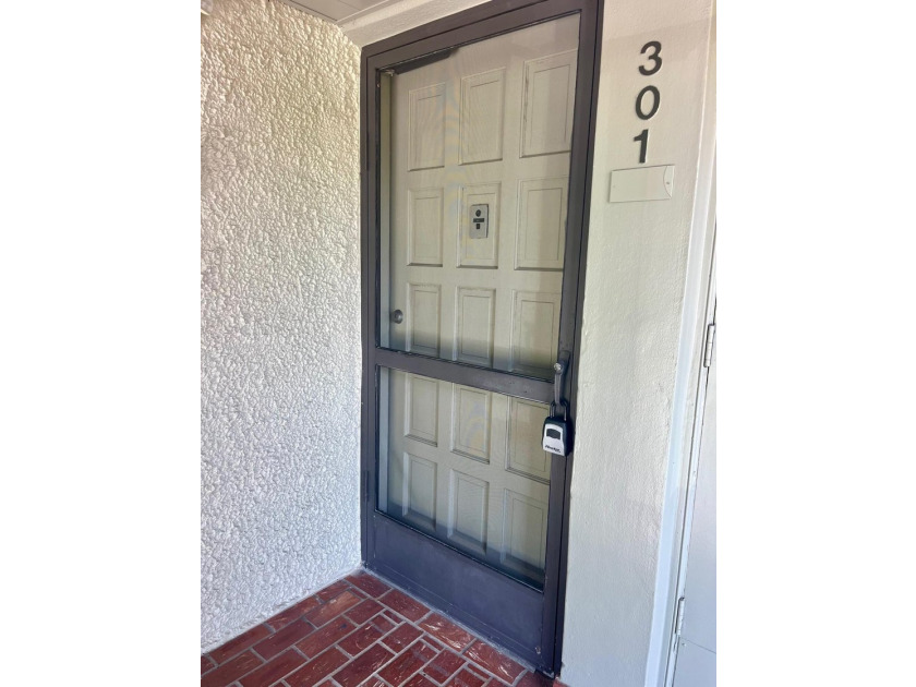 Welcome to this charming two-bedroom, two-bathroom condominium - photo 4