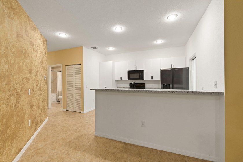 This home is move in ready, conveniently located to the beaches - photo 10