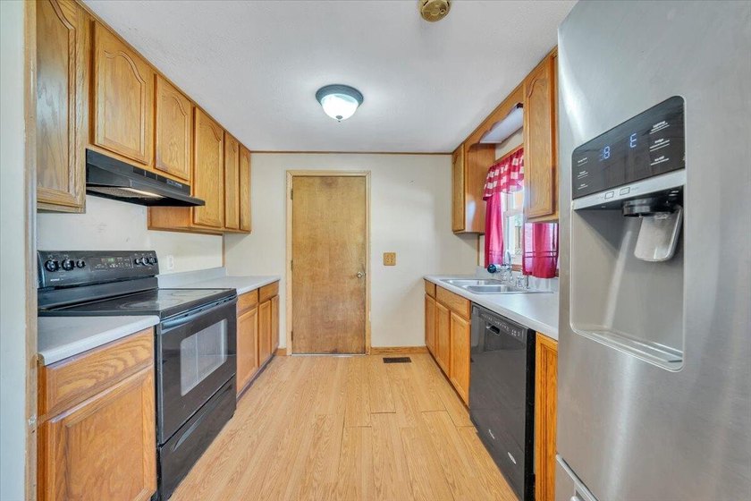 This one-level brick ranch offers plenty of potential and is - photo 13