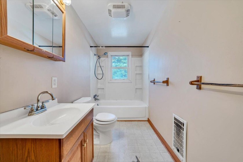 This one-level brick ranch offers plenty of potential and is - photo 21