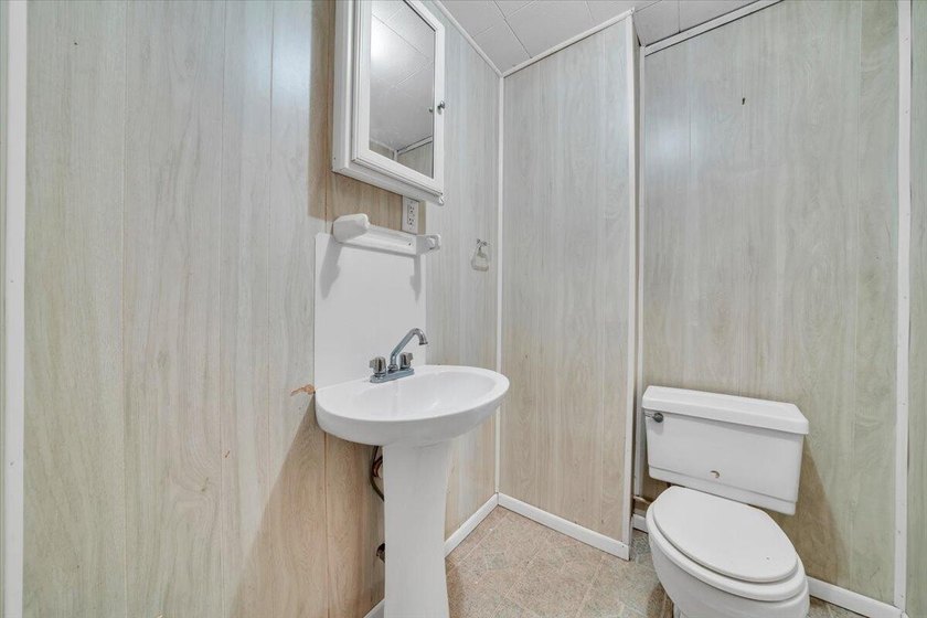This one-level brick ranch offers plenty of potential and is - photo 34