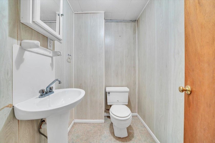 This one-level brick ranch offers plenty of potential and is - photo 35