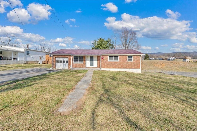 This one-level brick ranch offers plenty of potential and is - photo 52