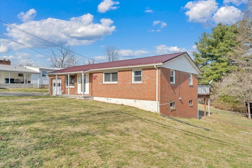 This one-level brick ranch offers plenty of potential and is - photo 53