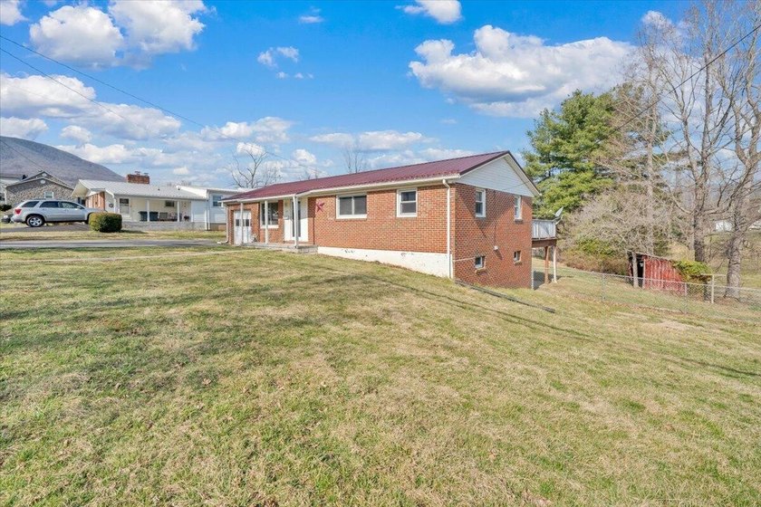 This one-level brick ranch offers plenty of potential and is - photo 54