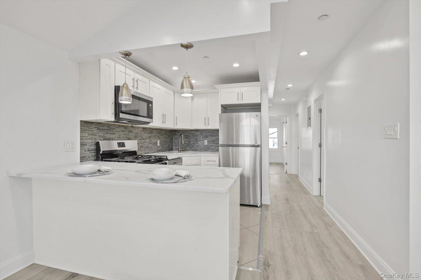 Welcome to this massive, detached 2-family home boasting 2,130 - photo 4