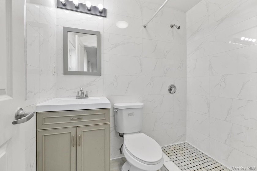 Welcome to this massive, detached 2-family home boasting 2,130 - photo 9