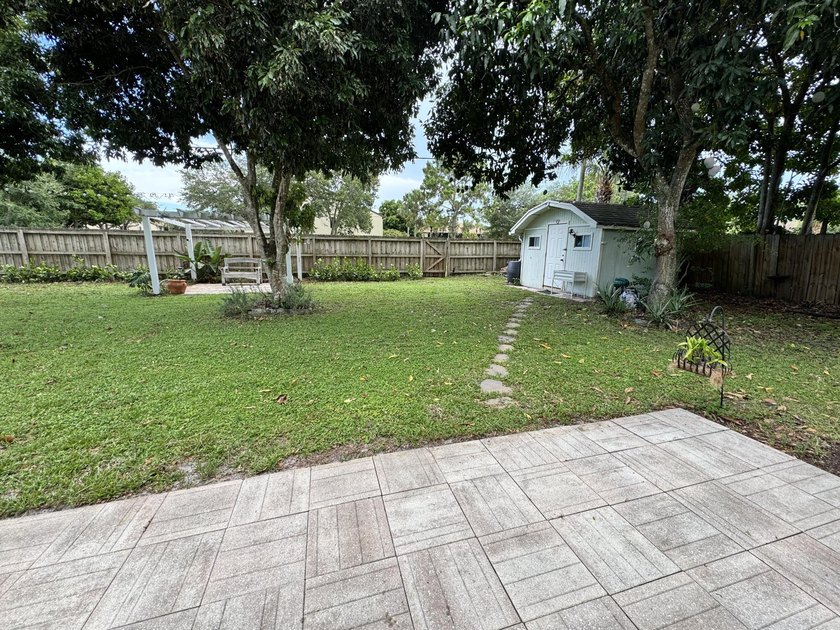 Welcome home! A rare opportunity in the heart of the Palm Beach - photo 28