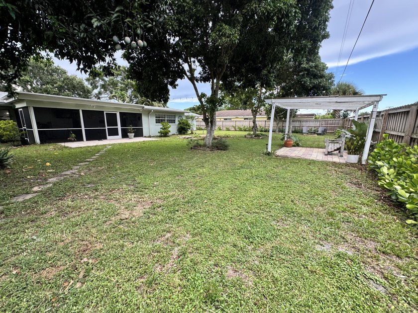 Welcome home! A rare opportunity in the heart of the Palm Beach - photo 30