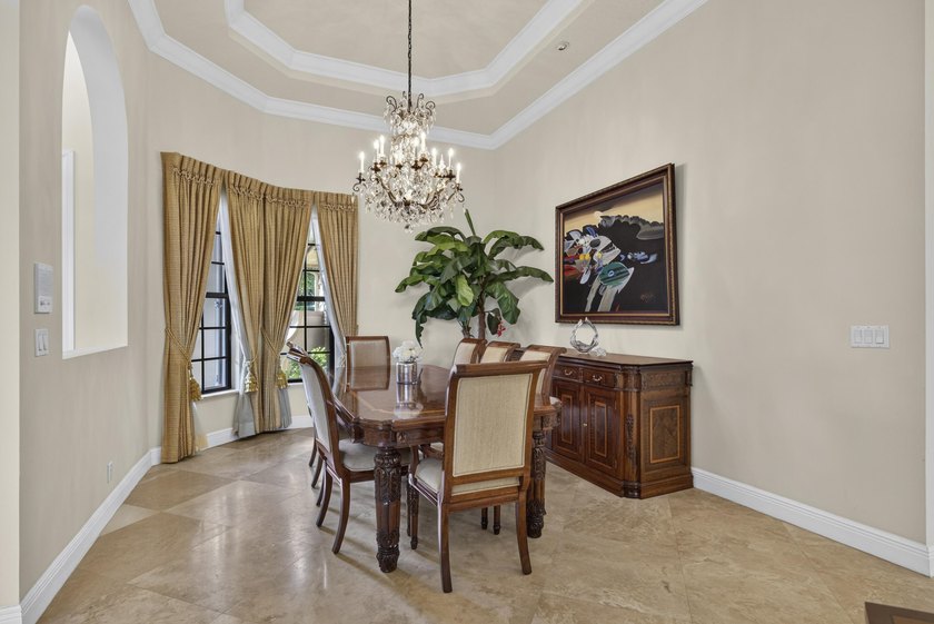 Welcome to luxury living in the prestigious Versailles community - photo 9
