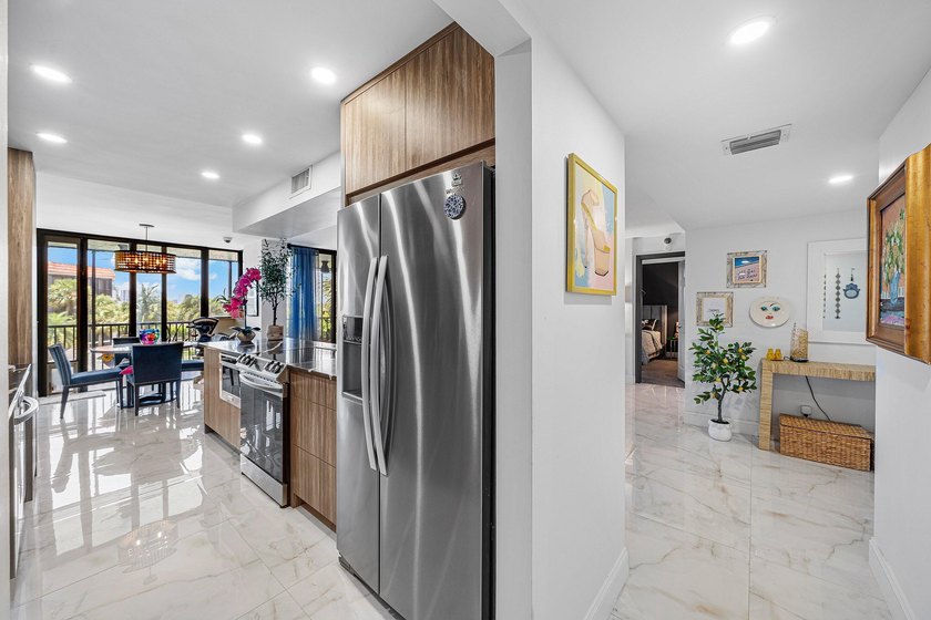 Welcome to this beautifully renovated residence featuring 2 - photo 11