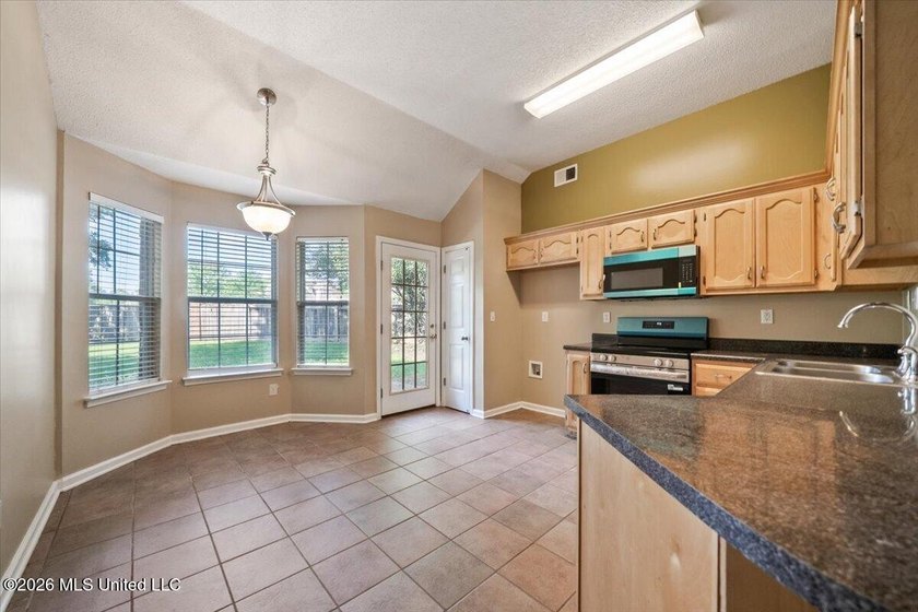 This beautifully designed home offers 4 bedrooms and 2 full - photo 7