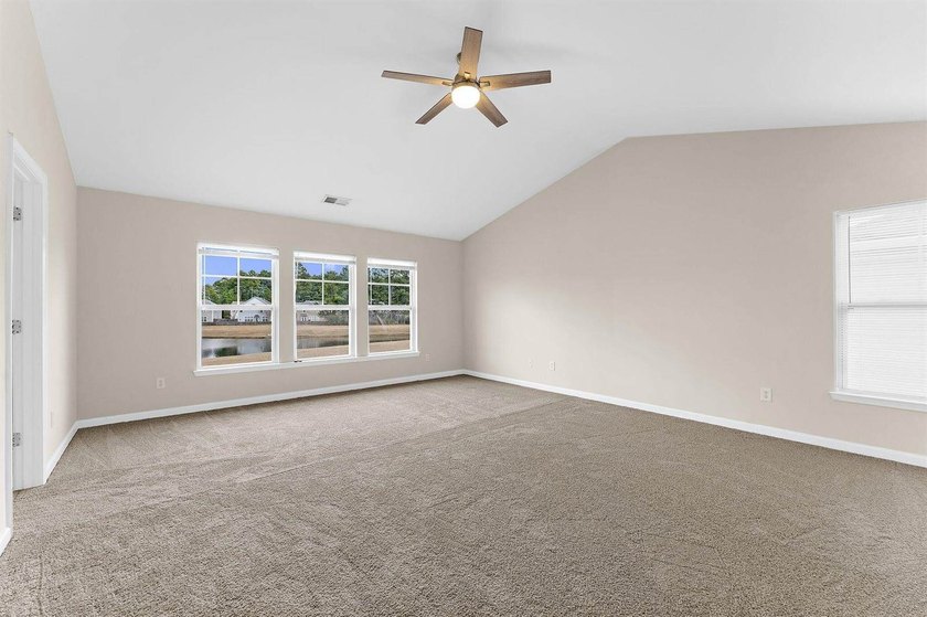 Welcome home to this beautiful 3,440 sq ft pond-front property - photo 37