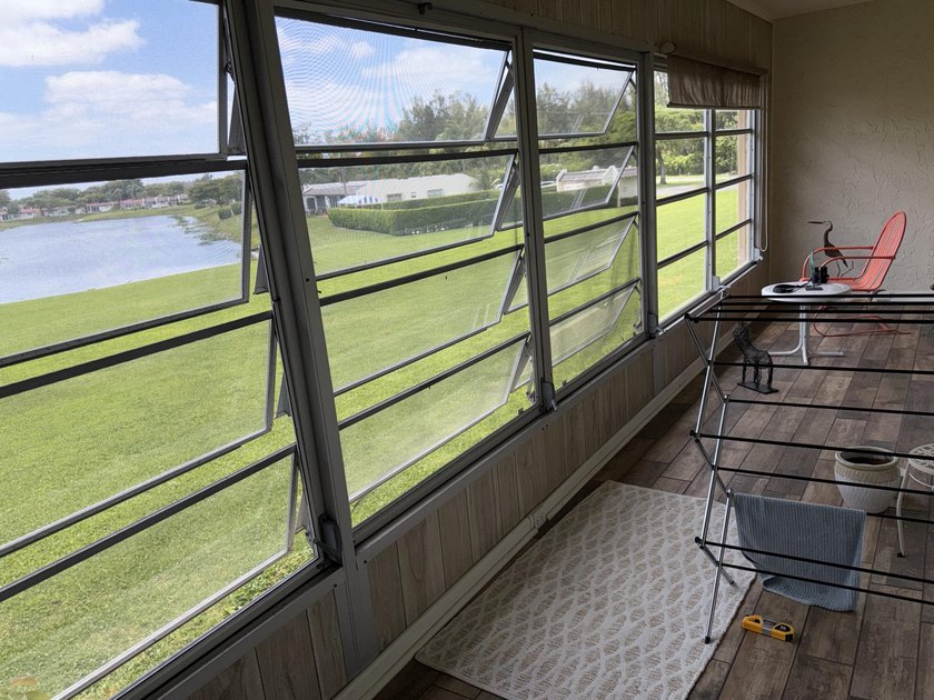 Beautifully renovated 2nd story lake front condominium in a - photo 17