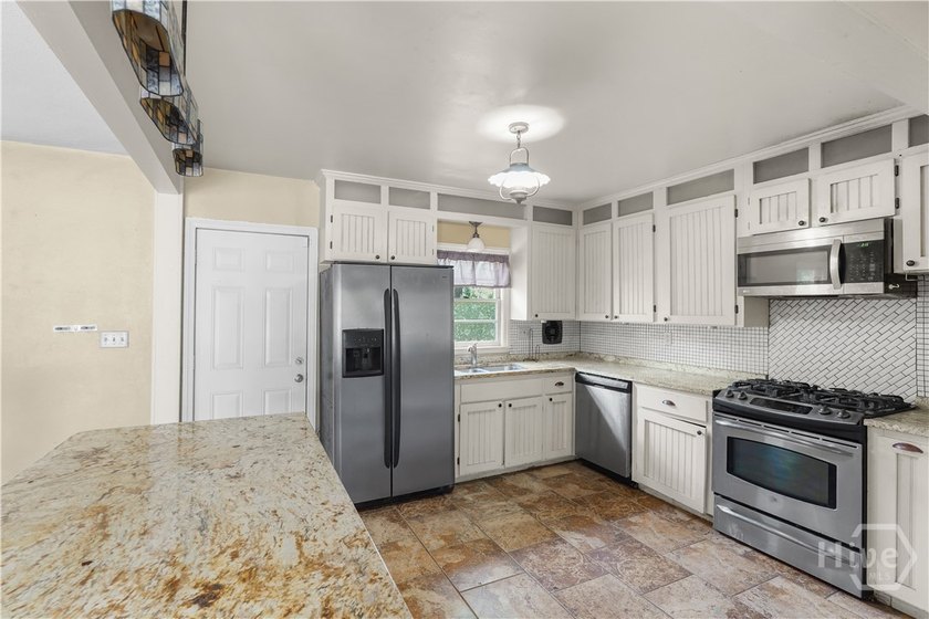 This charming 3-bedroom, 1.5-bath home offers a great - photo 5