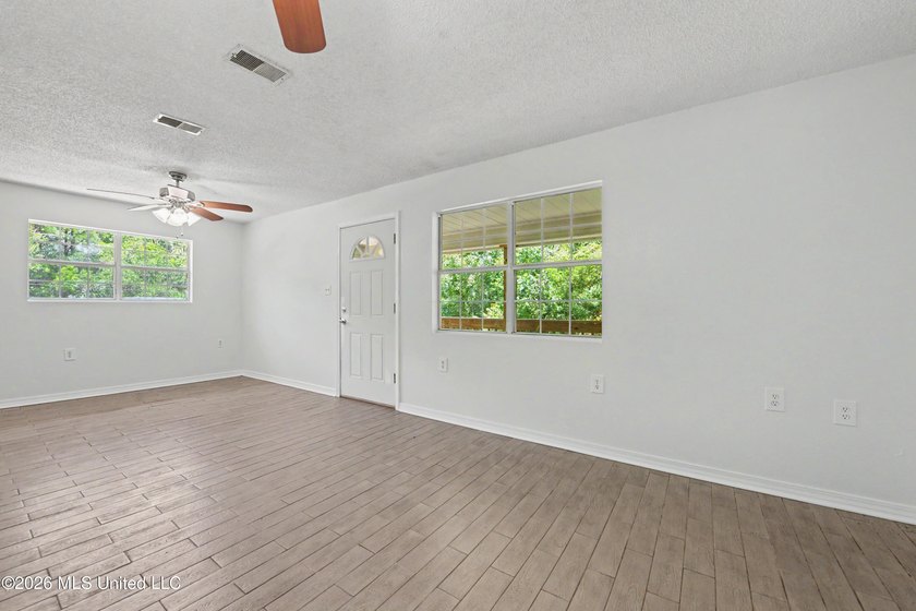 This cozy retreat home is in Bayou La Croix Estates, Bay St - photo 3