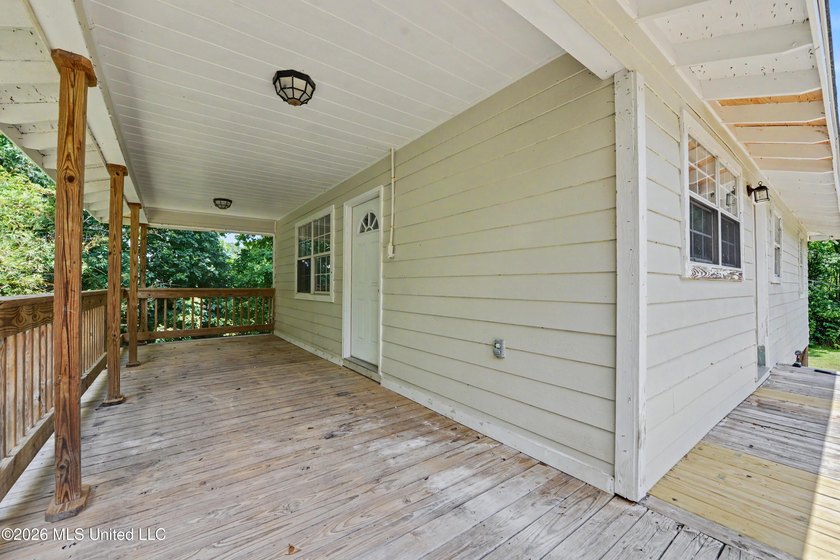 This cozy retreat home is in Bayou La Croix Estates, Bay St - photo 9