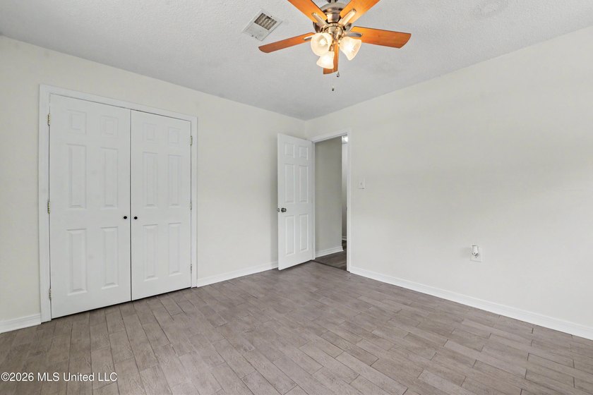 This cozy retreat home is in Bayou La Croix Estates, Bay St - photo 10