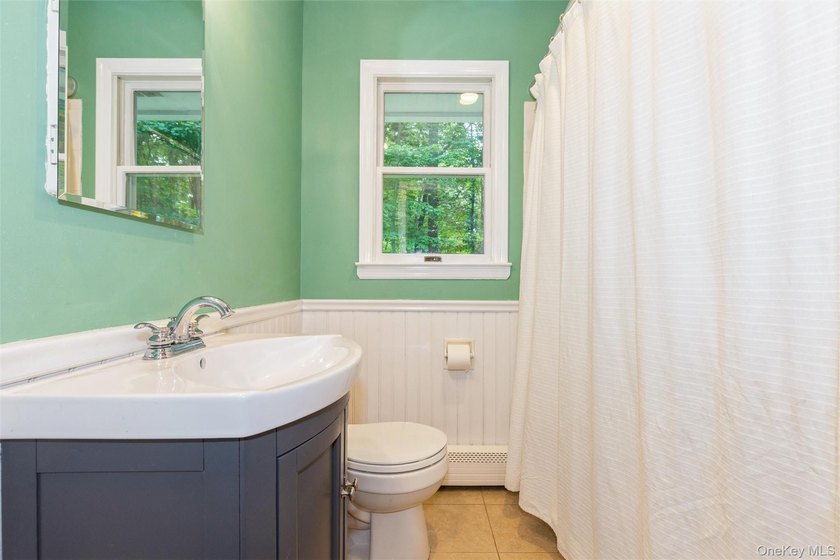 Welcome to this charming 3-bedroom, 2-bath home tucked away on a - photo 17
