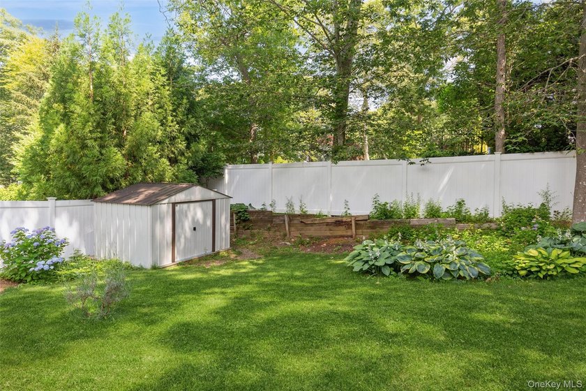 Welcome to this charming 3-bedroom, 2-bath home tucked away on a - photo 22
