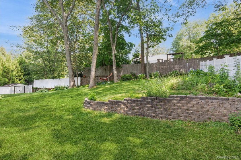Welcome to this charming 3-bedroom, 2-bath home tucked away on a - photo 24