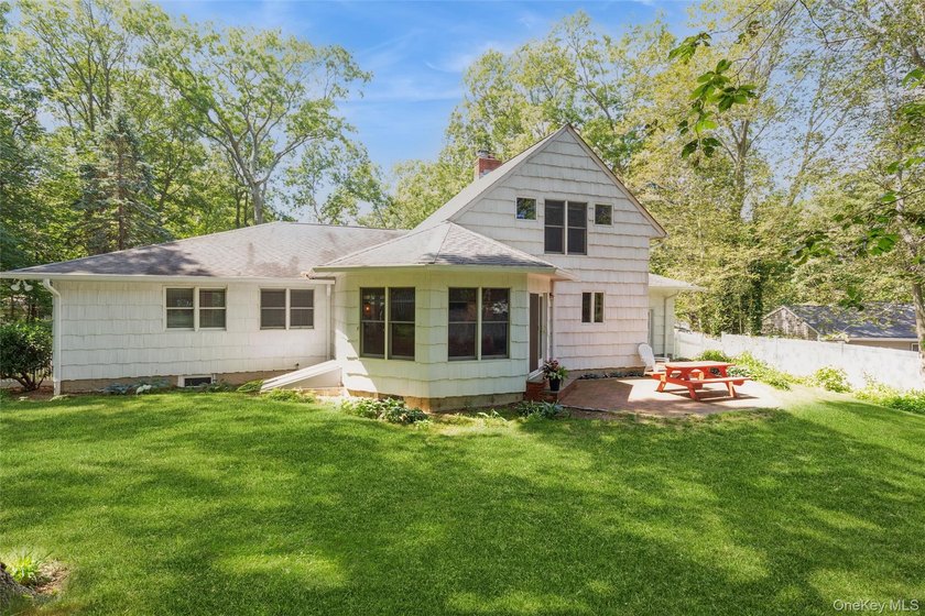 Welcome to this charming 3-bedroom, 2-bath home tucked away on a - photo 26