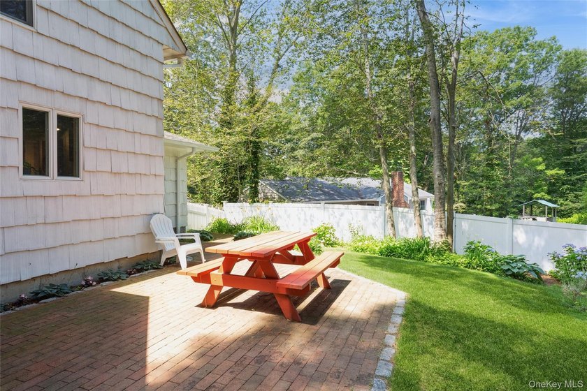Welcome to this charming 3-bedroom, 2-bath home tucked away on a - photo 27