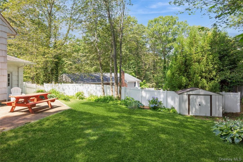 Welcome to this charming 3-bedroom, 2-bath home tucked away on a - photo 28