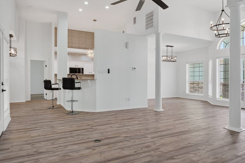 This lovely 2051 sq. ft. stucco home sits on a large lot in the - photo 11