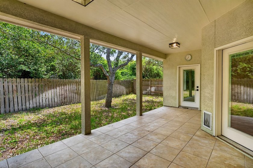 This lovely 2051 sq. ft. stucco home sits on a large lot in the - photo 28