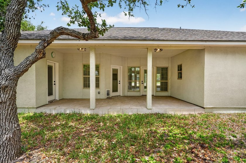 This lovely 2051 sq. ft. stucco home sits on a large lot in the - photo 30