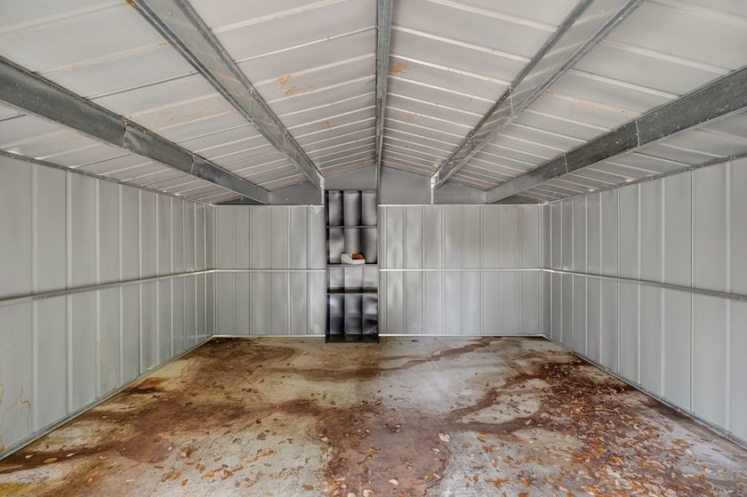 This lovely 2051 sq. ft. stucco home sits on a large lot in the - photo 33