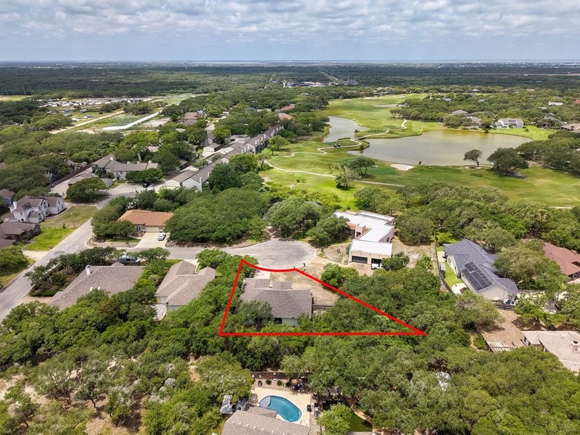 This lovely 2051 sq. ft. stucco home sits on a large lot in the - photo 36
