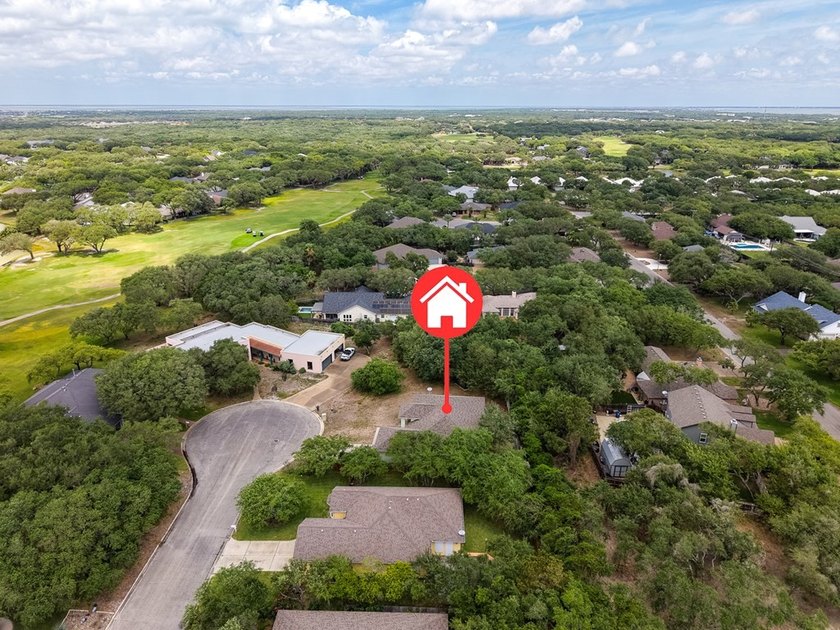 This lovely 2051 sq. ft. stucco home sits on a large lot in the - photo 40