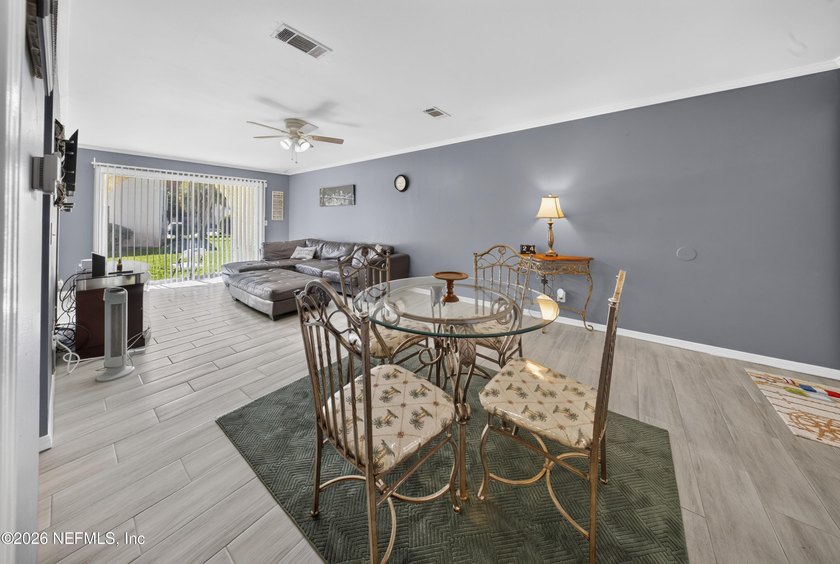 Welcome to this well-maintained ground-floor condo located in - photo 3