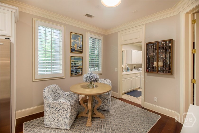 An exceptional townhome nestled within the gated enclave of - photo 12