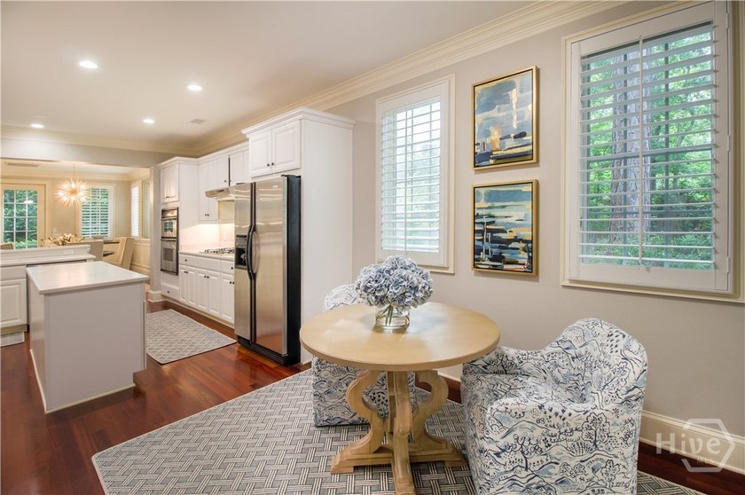 An exceptional townhome nestled within the gated enclave of - photo 13
