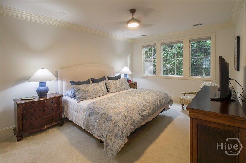 An exceptional townhome nestled within the gated enclave of - photo 30