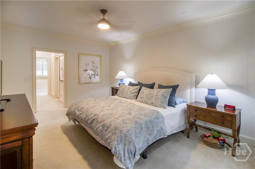 An exceptional townhome nestled within the gated enclave of - photo 31