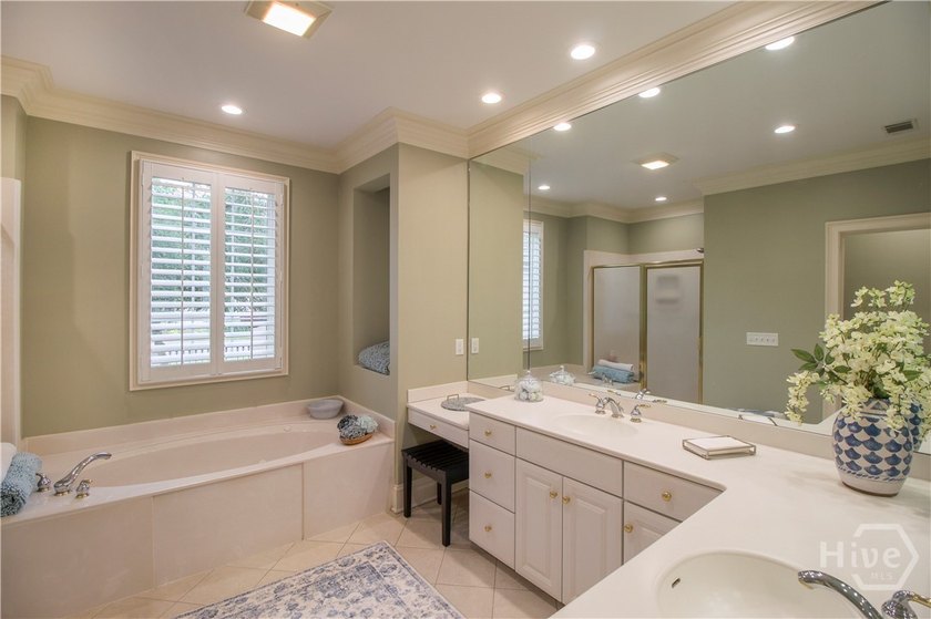 An exceptional townhome nestled within the gated enclave of - photo 32
