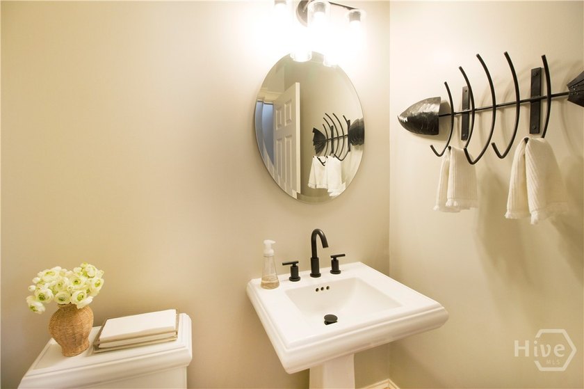 An exceptional townhome nestled within the gated enclave of - photo 37