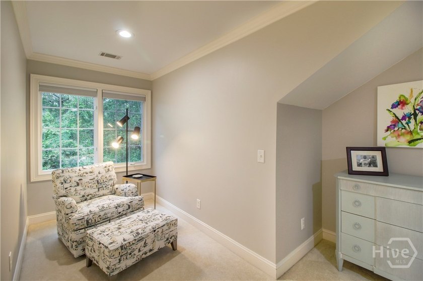 An exceptional townhome nestled within the gated enclave of - photo 45