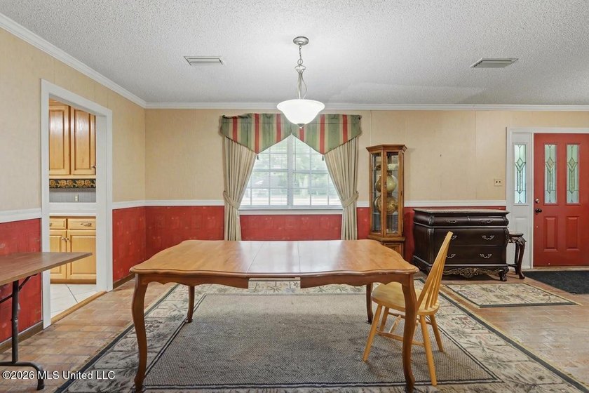 This large 1 level home has endless possibilities. 2 huge living - photo 6