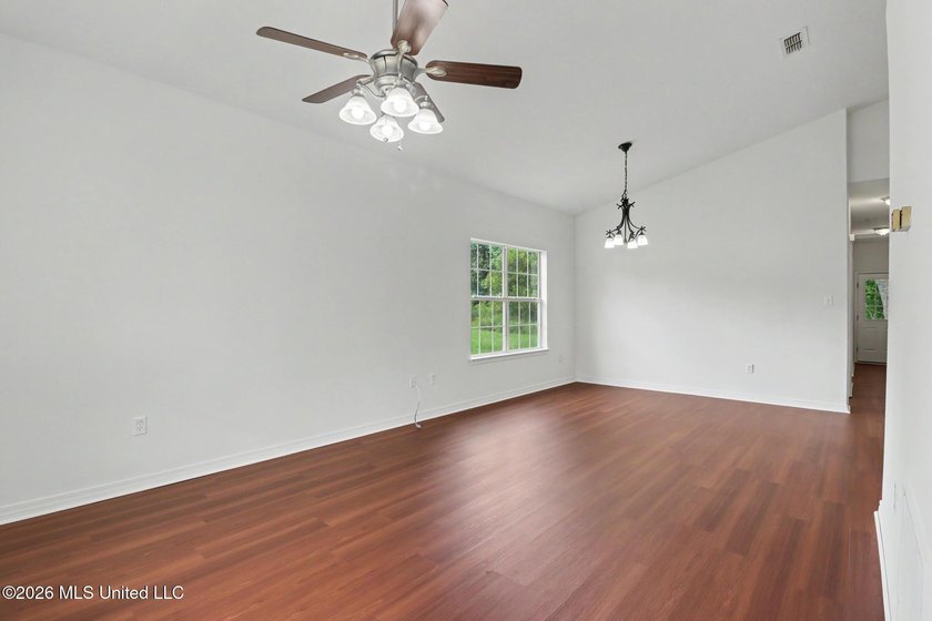 Welcome home to 11609 Oaklane Drive in north Gulfport! This - photo 2