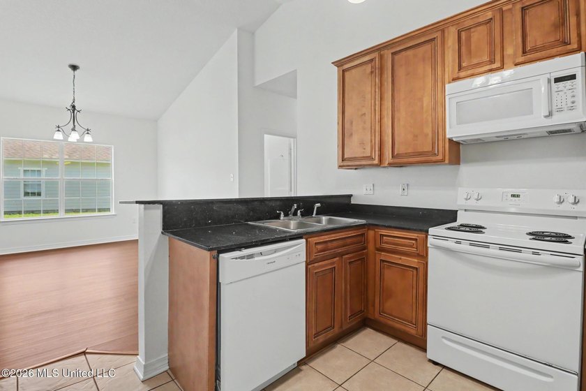 Welcome home to 11609 Oaklane Drive in north Gulfport! This - photo 8