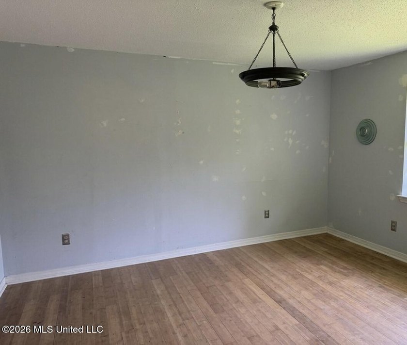 This expansive 5 bedroom, 3 bathroom, two story home offers the - photo 2